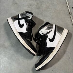 Nike High-Top Sneakers in Black, White, and Silver